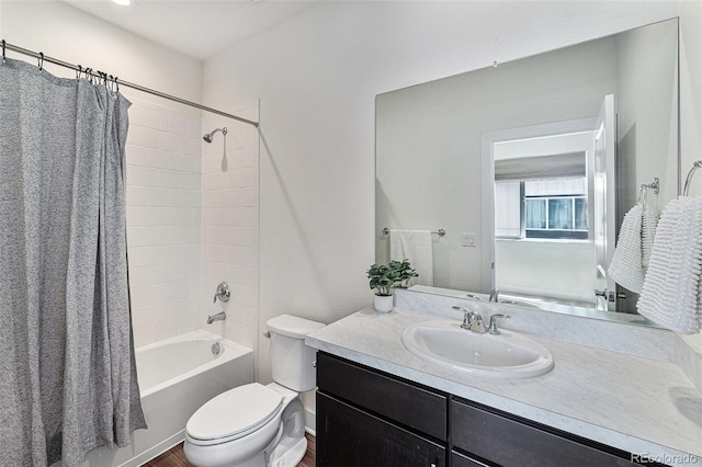 12336 W 52nd Ave, Wheat Ridge, CO 80033 - bathroom with shower / bath combo with shower curtain, vanity, and wood finished floors