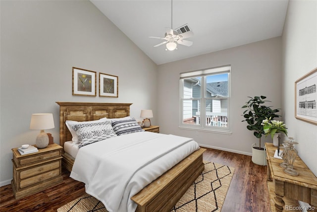bedroom with dark wood-style flooring, baseboards, ceiling fan, and high vaulted ceiling