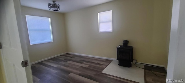 empty room featuring dark wood-type flooring