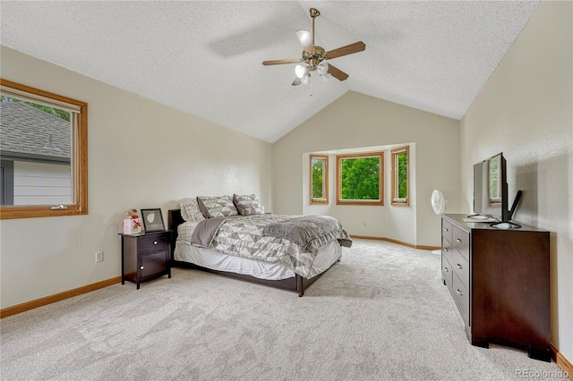19149 E Ida Dr, Aurora, CO 80015 - bedroom with multiple windows, baseboards, light colored carpet, lofted ceiling, and a textured ceiling