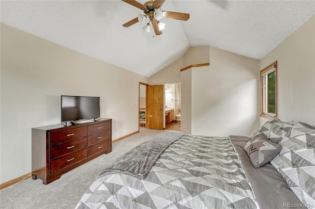 19149 E Ida Dr, Aurora, CO 80015 - carpeted bedroom featuring lofted ceiling, baseboards, ceiling fan, and ensuite bath