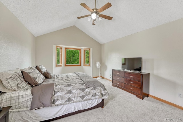 19149 E Ida Dr, Aurora, CO 80015 - bedroom with light carpet, lofted ceiling, baseboards, ceiling fan, and a textured ceiling