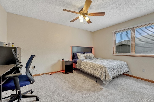19149 E Ida Dr, Aurora, CO 80015 - carpeted bedroom with a desk, baseboards, a textured ceiling, and ceiling fan