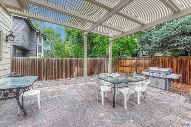 19149 E Ida Dr, Aurora, CO 80015 - fenced backyard with outdoor dining space, a pergola, and a patio area