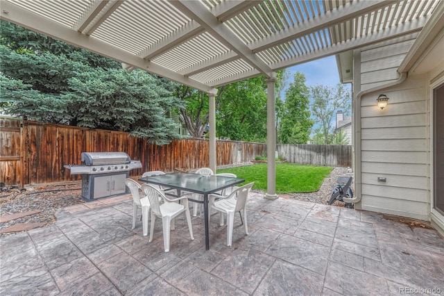 19149 E Ida Dr, Aurora, CO 80015 - view of patio / terrace with outdoor dining area, a pergola, and grilling area