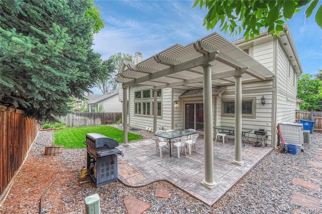 19149 E Ida Dr, Aurora, CO 80015 - fenced backyard featuring a pergola, area for grilling, and a patio area