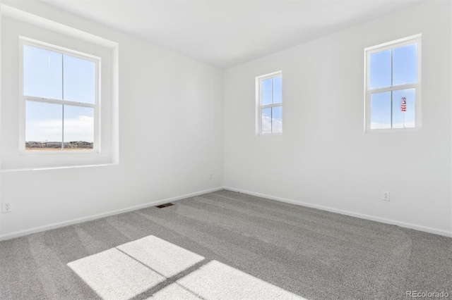 view of carpeted spare room