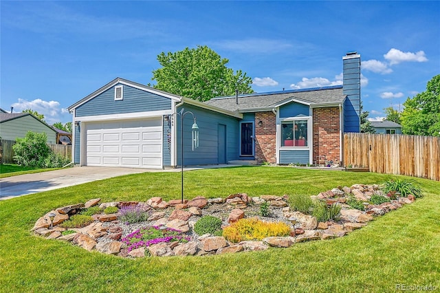 9446 W Wagon Trail Cir, Littleton, CO 80123 - single story home with an attached garage, driveway, a chimney, and brick siding