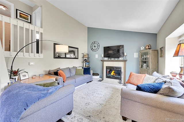 9446 W Wagon Trail Cir, Littleton, CO 80123 - living room with a tile fireplace and high vaulted ceiling