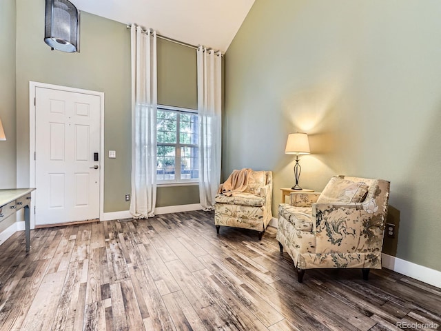9867 Mulberry Way, Highlands Ranch, CO 80129 - living area with high vaulted ceiling and wood finished floors