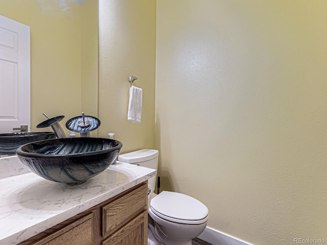 9867 Mulberry Way, Highlands Ranch, CO 80129 - half bath with vanity and toilet