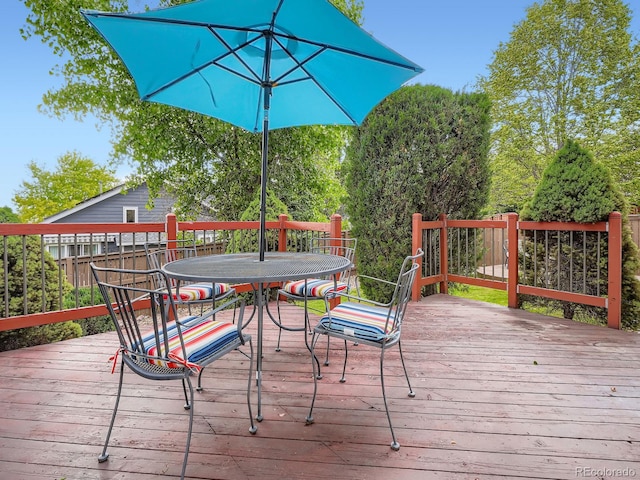 9867 Mulberry Way, Highlands Ranch, CO 80129 - wooden deck with outdoor dining area