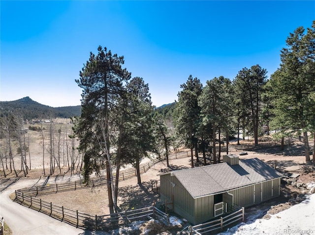 mountain view featuring a rural view