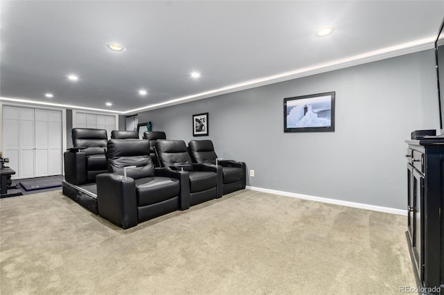 carpeted cinema featuring baseboards and recessed lighting