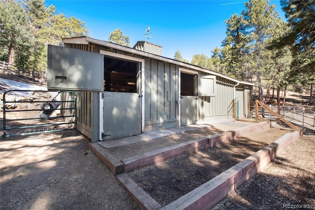 view of outbuilding with an exterior structure