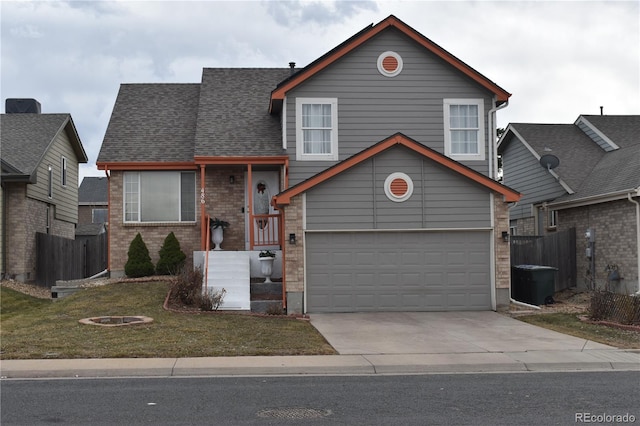 view of front of property with concrete driveway, roof with shingles, an attached garage, fence, and brick siding