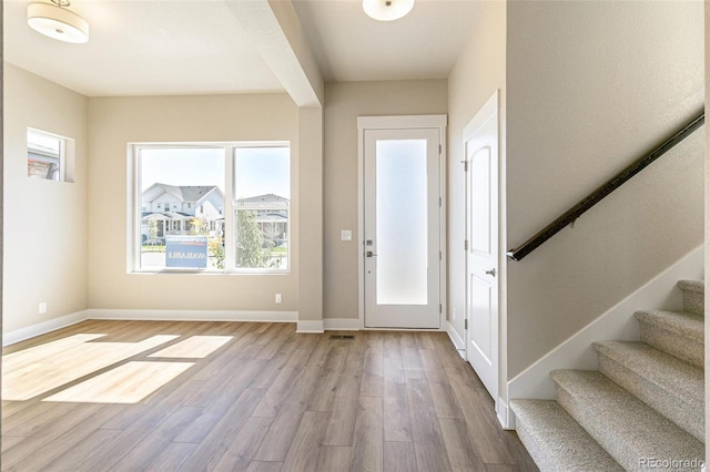 entrance foyer with light hardwood / wood-style floors