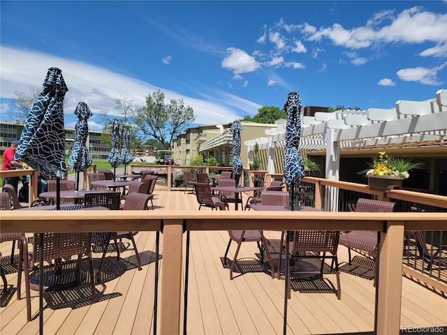 715 S Alton Way Unit 10A, Denver, CO 80247 - wooden terrace featuring outdoor dining area and a pergola
