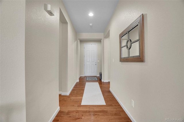 hallway featuring light wood-type flooring