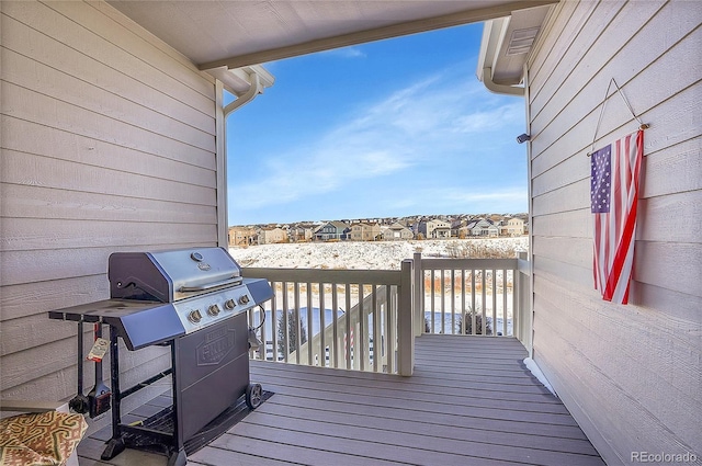 wooden terrace with area for grilling