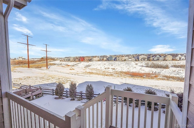 view of yard covered in snow