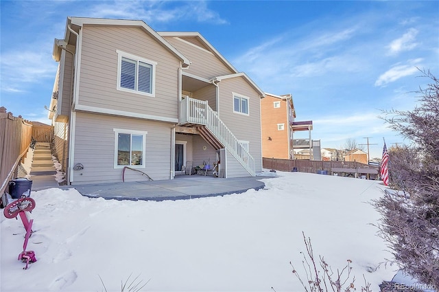 view of snow covered house