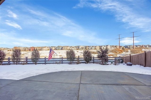 view of yard covered in snow