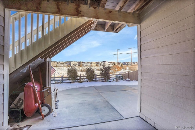 view of snow covered patio