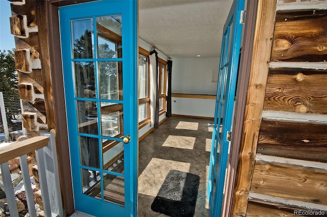 corridor with a textured ceiling