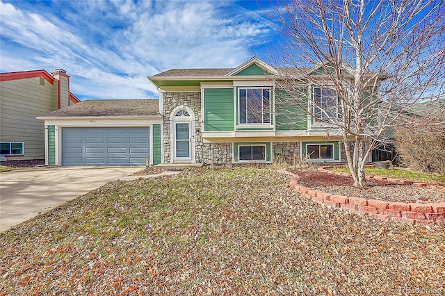 view of front of property with a garage