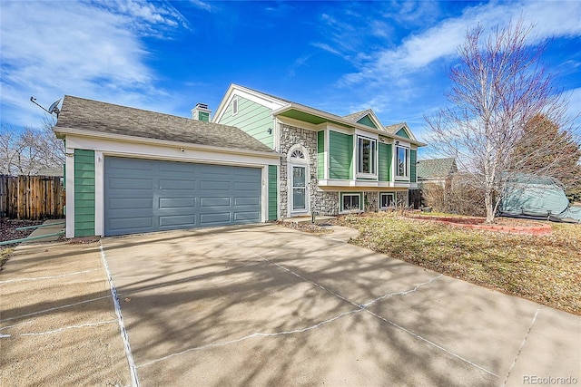 bi-level home with a garage