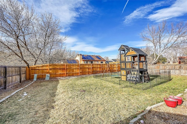 view of yard with a playground