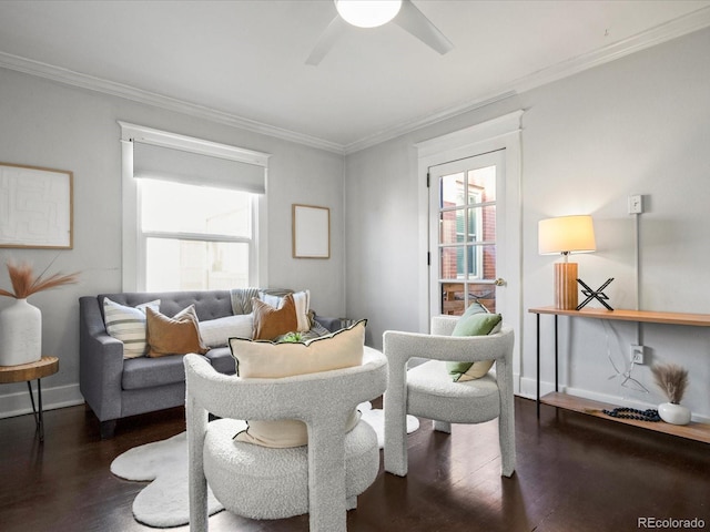 living room with ceiling fan, ornamental molding, and dark hardwood / wood-style floors