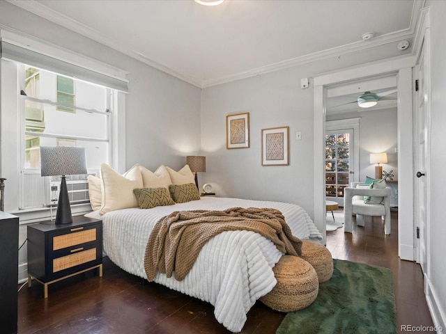 bedroom featuring crown molding, cooling unit, and dark hardwood / wood-style floors