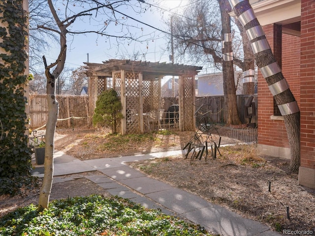 view of yard with a pergola