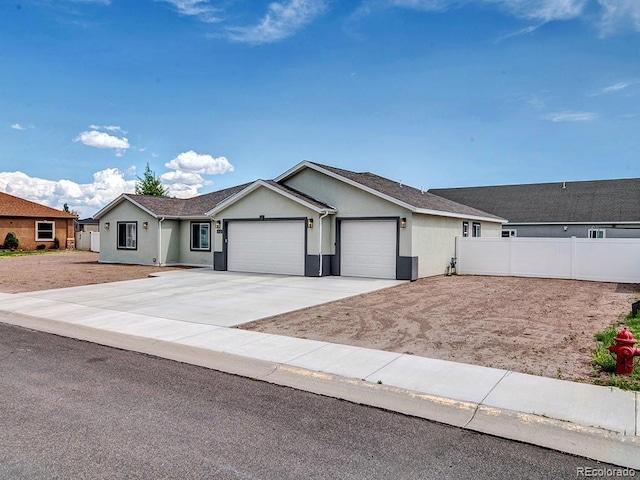 single story home with a garage