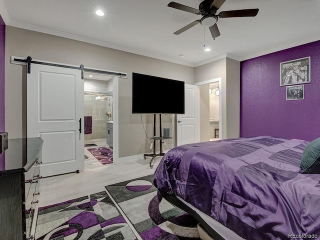 bedroom with connected bathroom, crown molding, a barn door, and ceiling fan