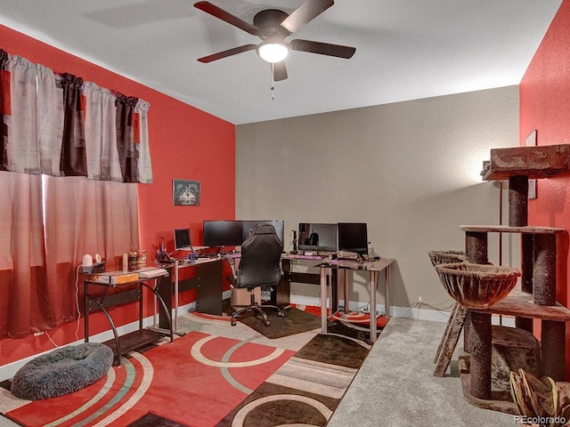 office featuring carpet floors and ceiling fan