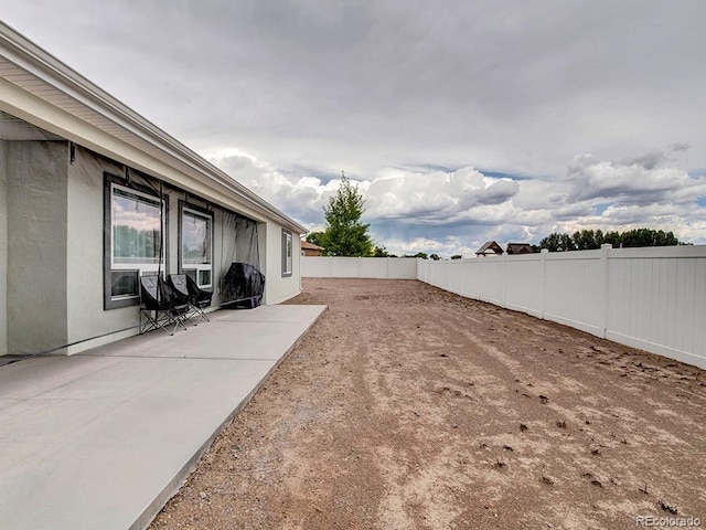 view of yard with a patio area