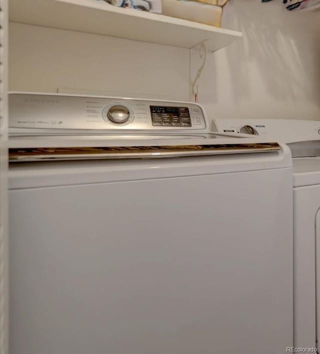 laundry room featuring washer / dryer