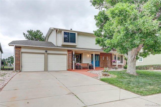 10137 W Berry Dr, Littleton, CO 80127 - traditional home with covered porch, brick siding, a garage, driveway, and a front lawn