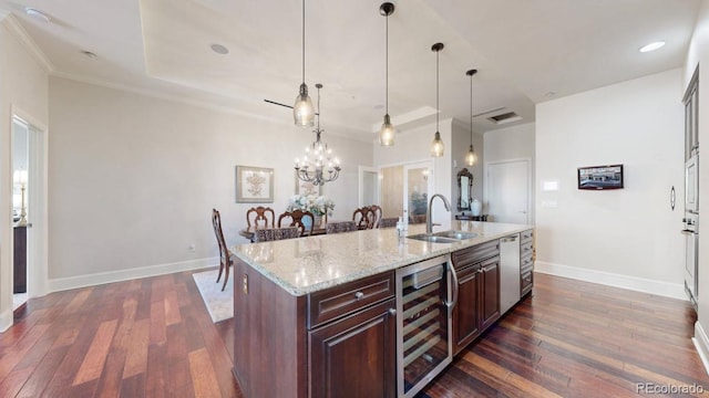 kitchen featuring a sink, baseboards, wine cooler, and dark wood-style floors