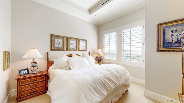 bedroom with light colored carpet, crown molding, and baseboards