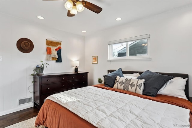 bedroom with recessed lighting, visible vents, dark wood-type flooring, and a ceiling fan