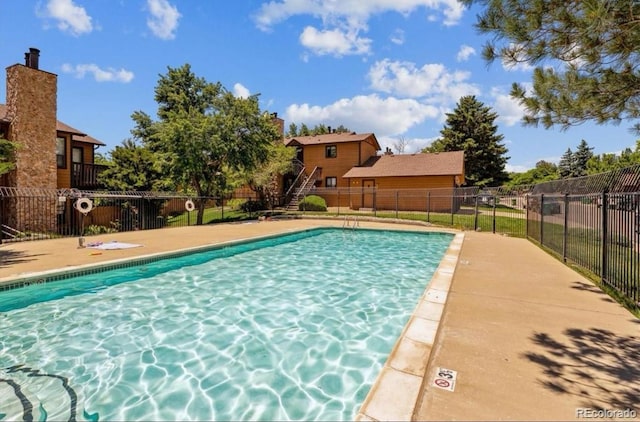 community pool with fence