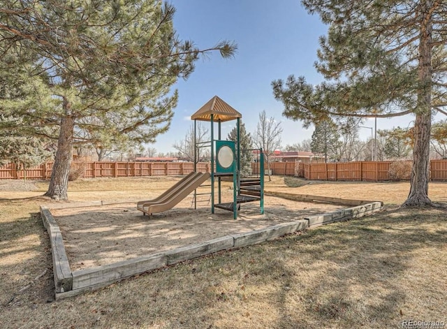 community jungle gym featuring fence