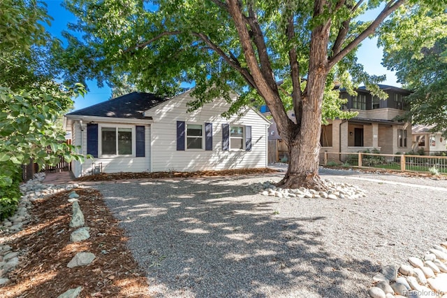 1160 S Monroe St, Denver, CO 80210 - view of front of house with fence