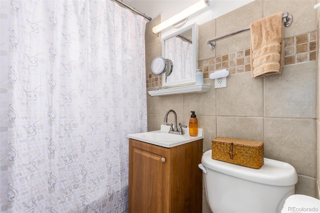 1160 S Monroe St, Denver, CO 80210 - bathroom featuring toilet, vanity, a shower with curtain, and tile walls