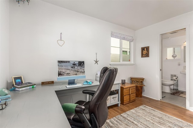 1160 S Monroe St, Denver, CO 80210 - home office with baseboards and wood finished floors