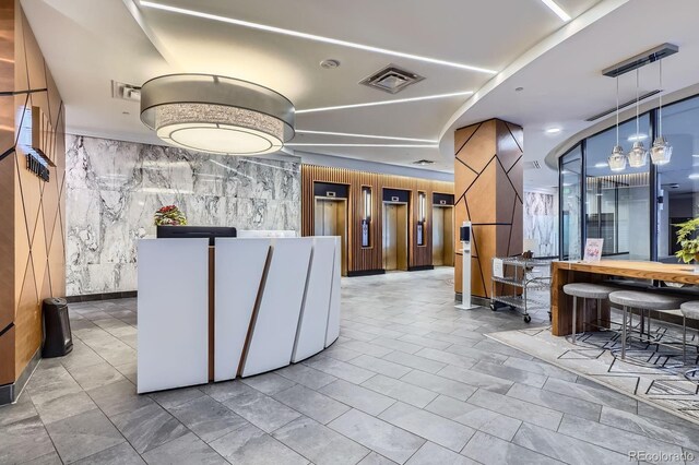 reception with a community bar and visible vents